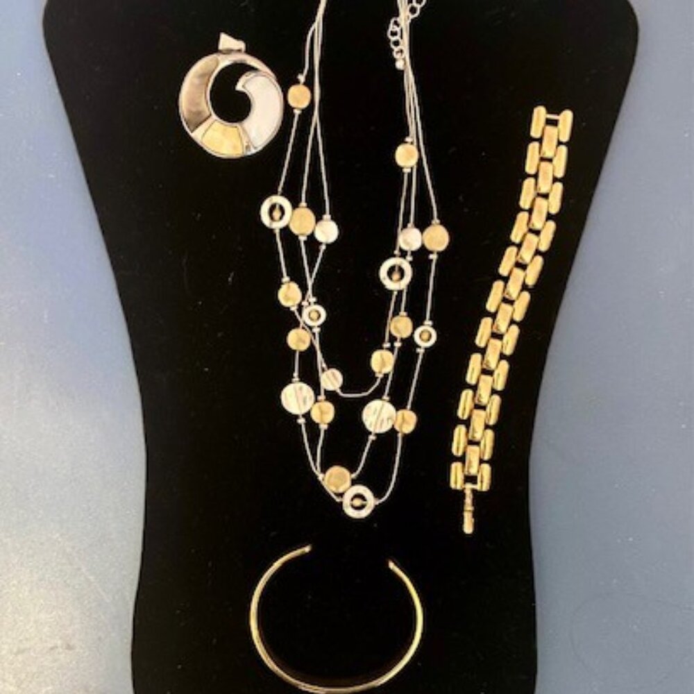 Costume jewelry in gold and silver tones